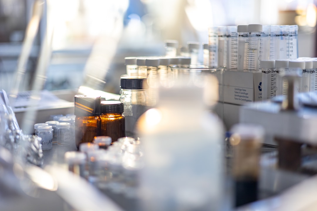 bottles-of-medicine-are-lined-up-on-a-table-bwo7bcnez68